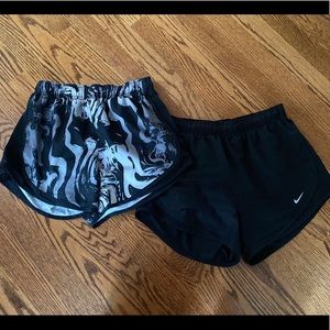 2 pairs of nike running shorts